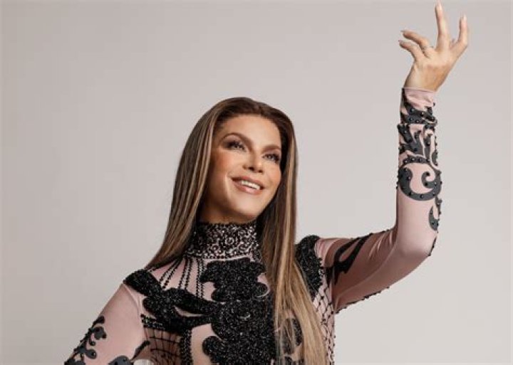 Olga Tañón - Age, Family, Bio